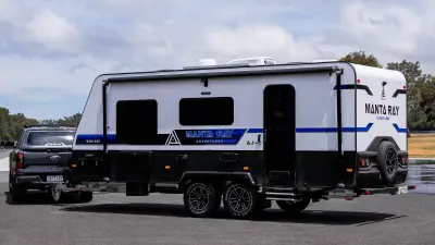 a blue trailer in the road